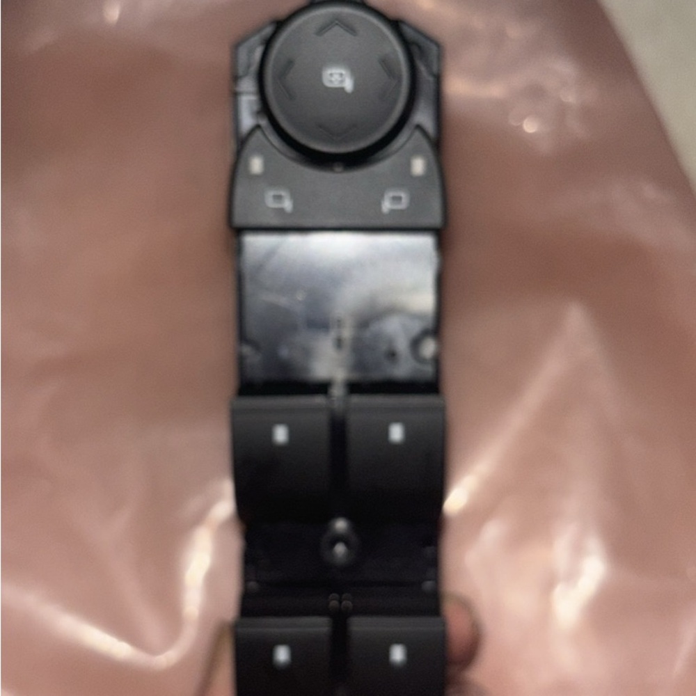 Chevy driver side master power lock window control unit.